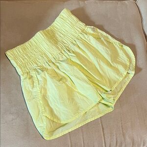 FP Movement by Free People Light Yellow Athletic Shorts
